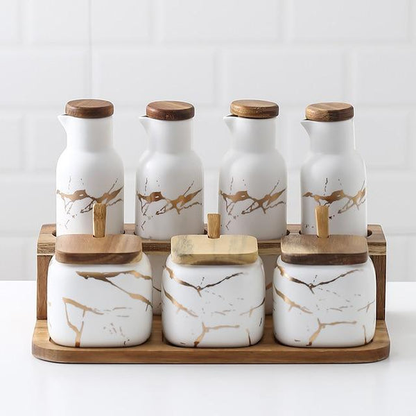 Marble-Print Ceramic Spice Jar Set — Eight-piece ceramic and wood spice set with marble-print glaze finish