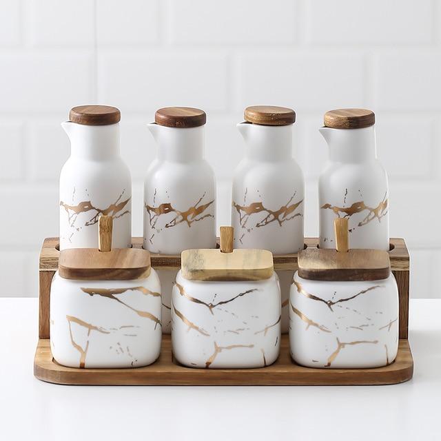 Marble-Print Ceramic Spice Jar Set — Eight-piece ceramic and wood spice set with marble-print glaze finish