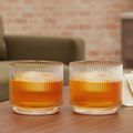 Ribbed Crystal Gold-Rim Tumbler Set styled in a warm editorial loft