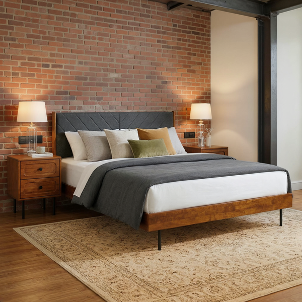 Chevron Upholstered Wood Platform Bed in a warm brick and steel loft bedroom with neutral bedding and a flat rug.