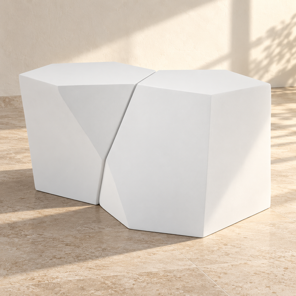 Geometric MGO Coffee Table Set against a cream limewash wall on a travertine floor in warm afternoon light