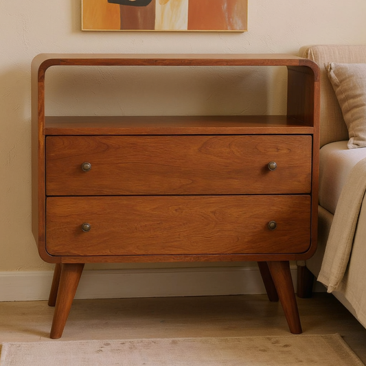 Chestnut Mango Wood Curved Two-Drawer Nightstand in a styled home interior