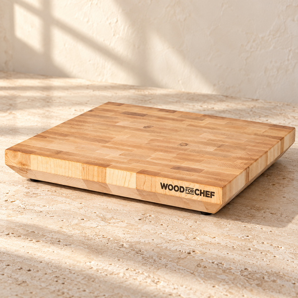 End Grain Wood Butcher Block Cutting Board — Maple Wood / 18x16x2 in on a sunlit pale travertine counter