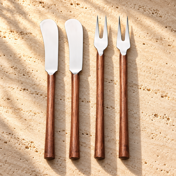 Wood-Handle Stainless Steel Cheese Tool Set on a sunlit pale travertine counter