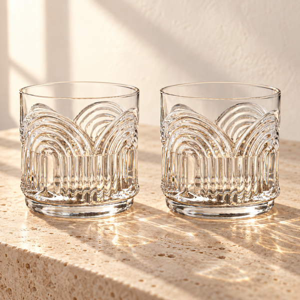 Art Deco Crystal Lowball Tumbler Set empty on honed travertine in warm side light