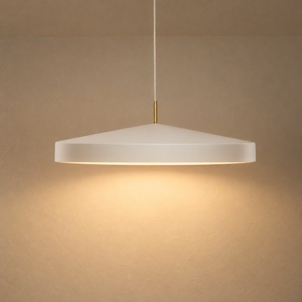 Matte White Powder-Coated Pendant Light illuminated against cream plaster
