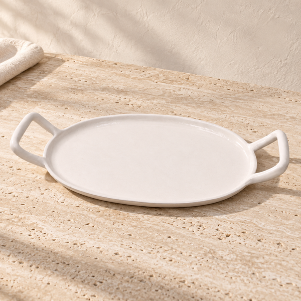 Charlotte Serving Tray on a sunlit pale travertine counter