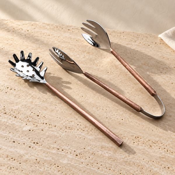 Copper-Finish Stainless Steel Pasta Server Set on a sunlit pale travertine counter