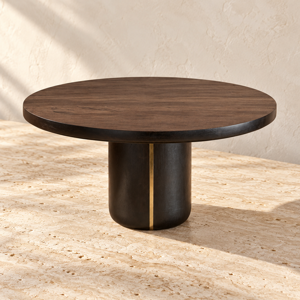 Dark-Stained Wood Pedestal Stand on a sunlit pale travertine counter
