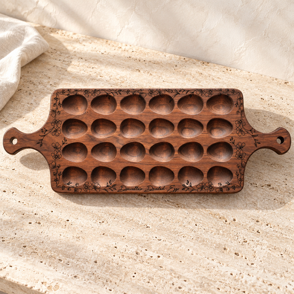 Engraved Wood Deviled Egg Serving Board on a sunlit pale travertine counter
