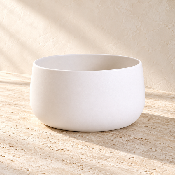 Handmade Stoneware Large Serving Bowl on a sunlit pale travertine counter