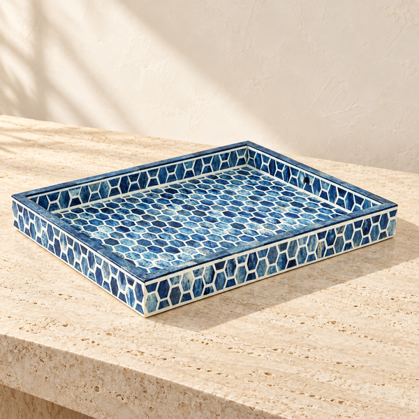 Indigo Honeycomb Bone Inlay Serving Tray on a sunlit pale travertine counter