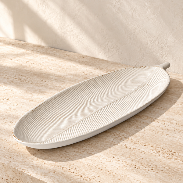 Leaf-Embossed MDF Decorative Tray on a sunlit pale travertine counter