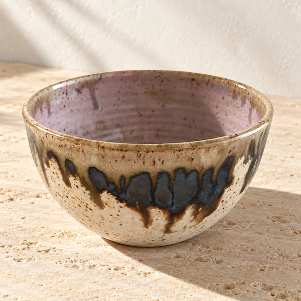 Reactive Glaze Stoneware Bowl on a sunlit pale travertine counter