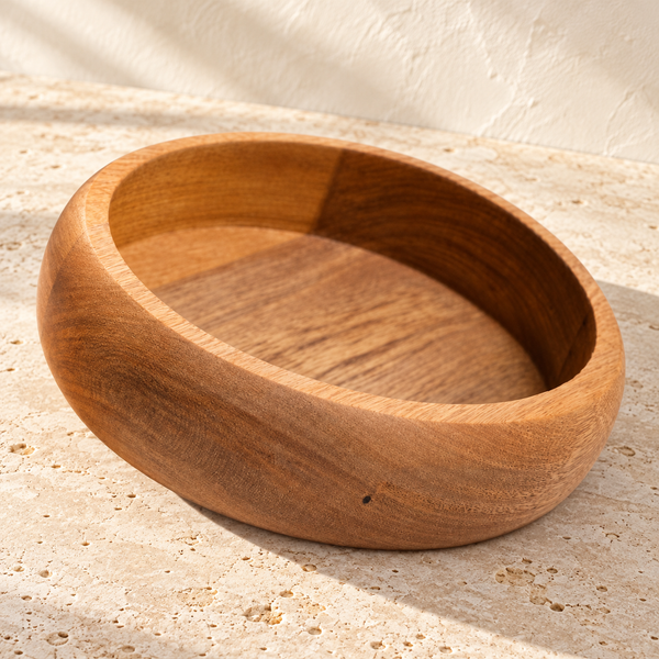 Turned Hardwood Snack Serving Bowl on a sunlit pale travertine counter