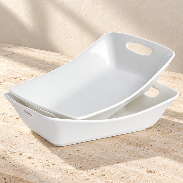 White Porcelain Handled Serving Bowl Set on a sunlit pale travertine counter