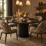 Round Black Pedestal Dining Table with Storage in a fully styled dining room