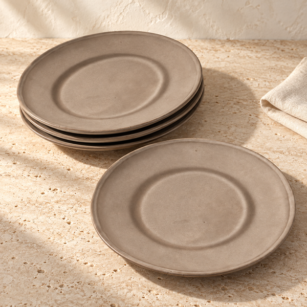 Earth-Glaze Oval Ceramic Dinner Plate Set on a sunlit travertine counter