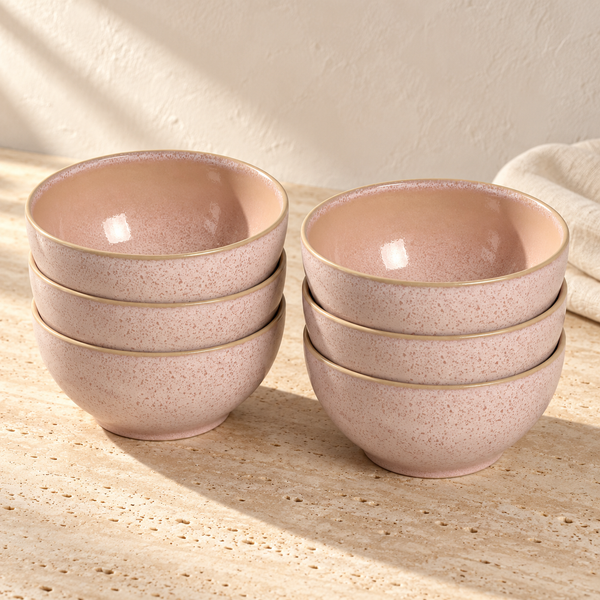 Speckled Ceramic Bowl Set of Six in Litchi on a sunlit travertine counter