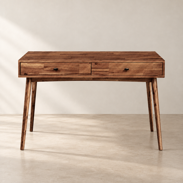Walnut mid-century writing desk with two drawers against a clean off-white wall
