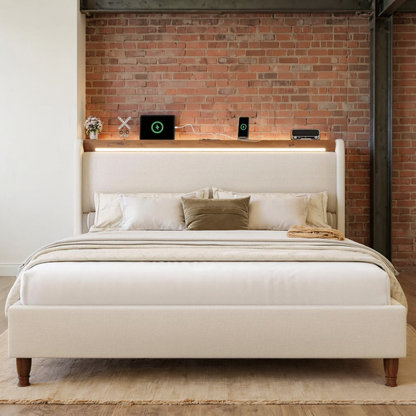 Upholstered Queen Bed Frame With LED and USB styled with ivory bedding in a brick and steel loft bedroom with a flat oatmeal rug.