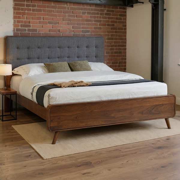 Robyn Wood Eastern King Platform Bed Dark Walnut in a warm brick and steel loft bedroom with ivory bedding and a flat oatmeal rug.