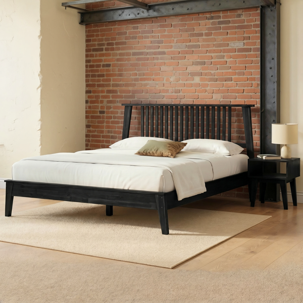 Spindle Headboard Solid Wood Bed & Nightstand Set in a warm brick and steel loft bedroom with ivory bedding and a flat oatmeal rug, showing the included matching nightstand.