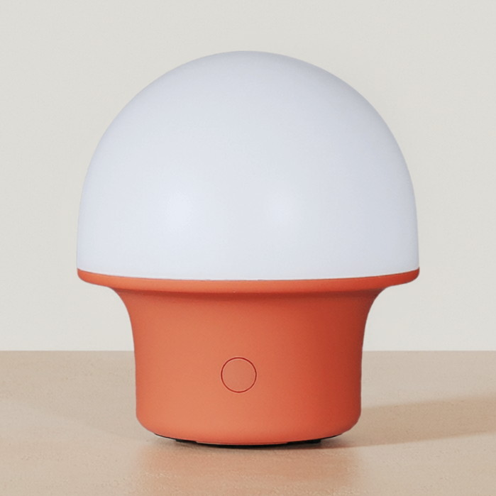 Cordless Portable Dome Table Lamp on a neutral concrete tabletop