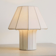 Resin Mushroom Table Lamp on a neutral concrete tabletop