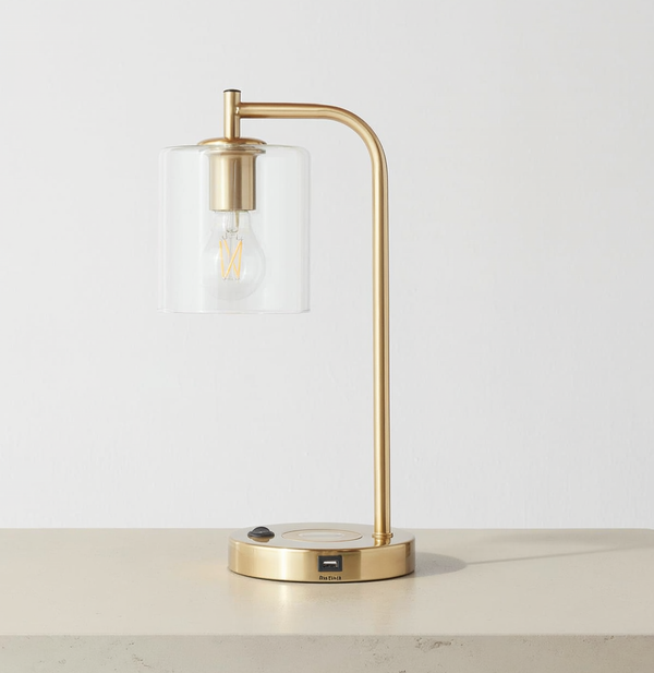 Brass USB Table Lamp with Glass Shade & Wireless Charging on a neutral concrete tabletop