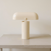 Rechargeable Mushroom-Shade Table Lamp in all-cream finish on a neutral concrete tabletop