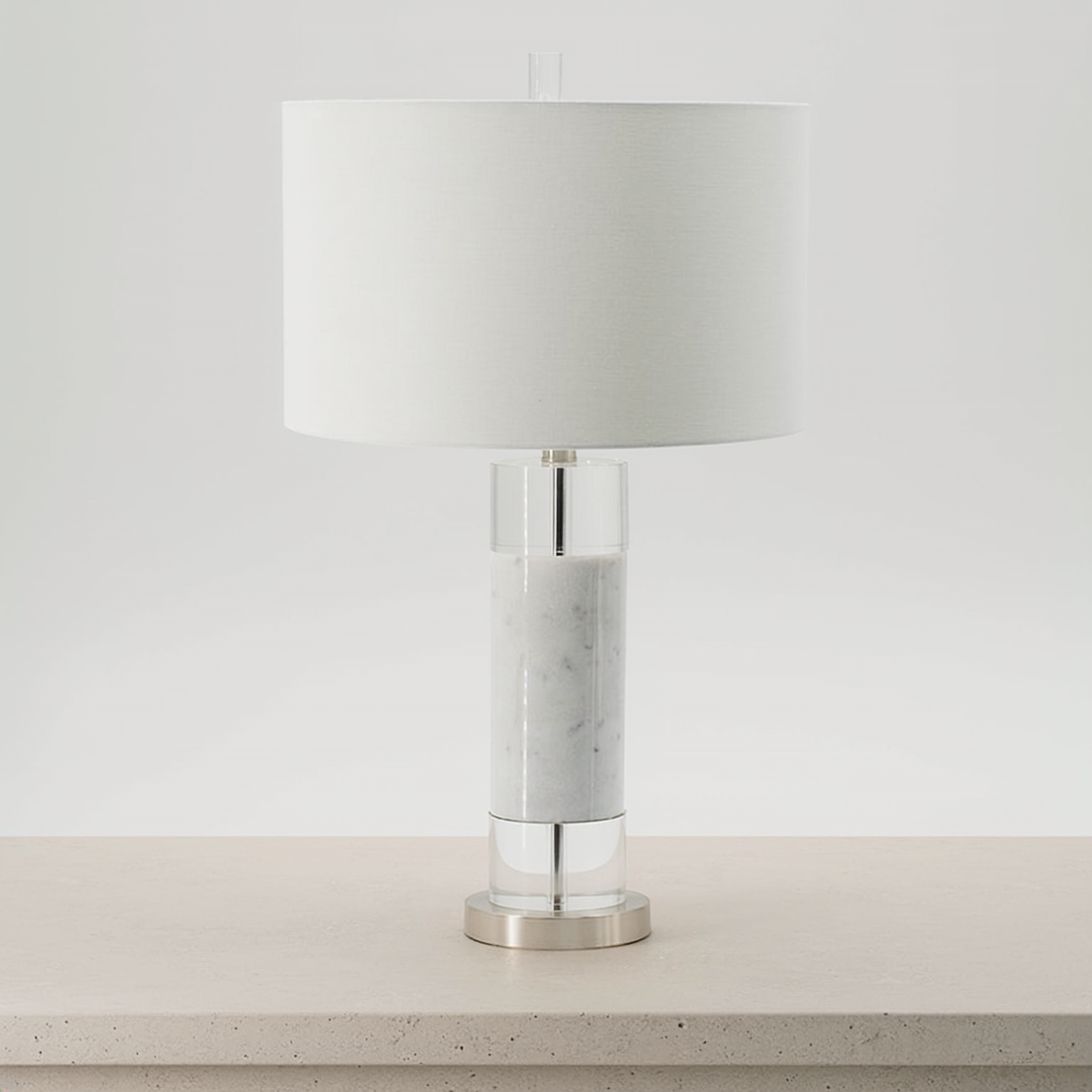 Marble and Crystal Column Table Lamp on a neutral concrete tabletop
