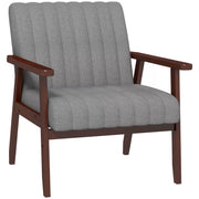 Channel-Tufted Grey Fabric Armchair styled on a sunlit patio with side table