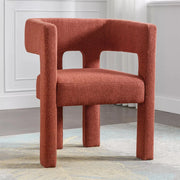Bouclé Sculptural Accent Armchair styled on a sunlit patio with side table