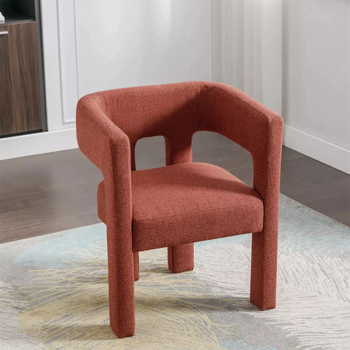 Bouclé Sculptural Accent Armchair — Sculptural bouclé armchair with open-back frame in three earthy colorways