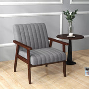 Channel-Tufted Grey Fabric Armchair — Channel-tufted grey fabric seat on a dark walnut-finish wood frame