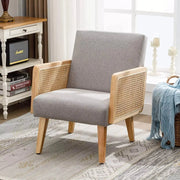 Rattan Cane Upholstered Accent Armchair — Rattan cane armrests, padded fabric seat, tapered wood legs — two tones