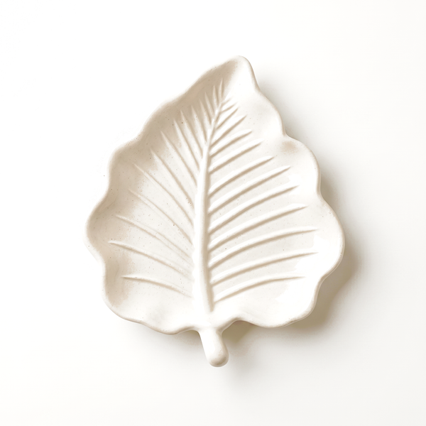 Cast Gypsum Leaf Catchall Tray in a styled room setting
