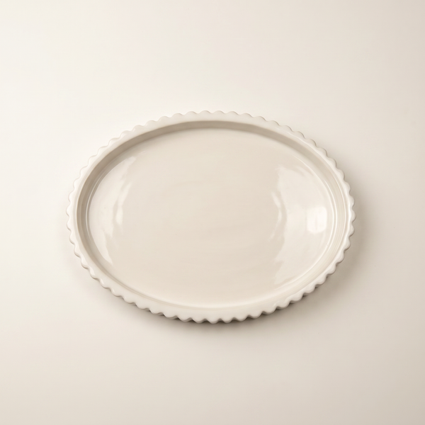 Top view of Scalloped Gypsum Oval Catchall Tray