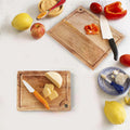 Mango Wood Cutting Board Set — Two-piece mango wood set with juice grooves for prep and serving