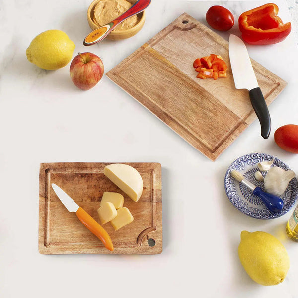 Mango Wood Cutting Board Set — Two-piece mango wood set with juice grooves for prep and serving