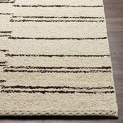 Front view of The Tarry Rug