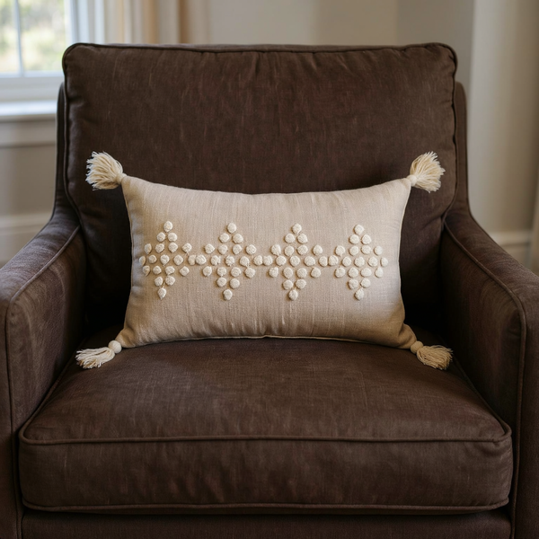 Tufted Cotton Lumbar Pillow styled on coordinated seating