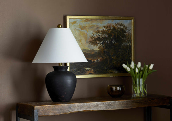 Matte Ceramic Urn Table Lamp — Dark ceramic urn base with fabric shade and brass-tone hardware